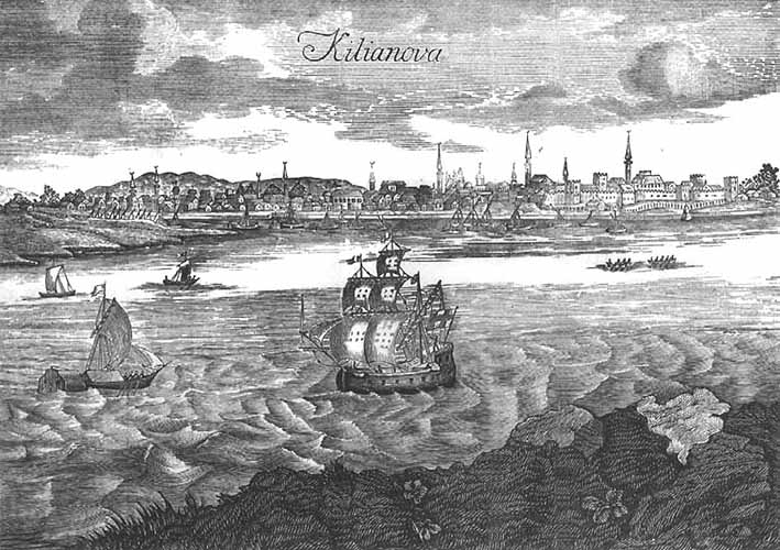 Kserokopia grafiki. Przedstawia pejzaż z widokiem na miasto. Na pierwszym planie zatoka i statki. W oddali, na horyzoncie miasto. Powyżej niebo z ciemnymi chmurami.