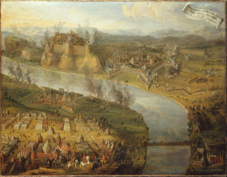 Obraz olejny. Bitwa pod Ostrzyhomiem. Kompozycję rozdziela na dwie części rzeka, na której brzegach przedstawione zostały obie strony stoczonej w 1683 roku bitwy. W dolnej części obrazu, z lewej strony widzimy rozłożony w zakolu Dunaju obóz polski, połączony mostem ze stacjonującymi na prawym brzegu wojskami cesarsko-bawarskimi. Na pierwszym planie król Jan III Sobieski na białym koniu. W głębi, na brzegu, ufortyfikowane Parkany i stanowiska polskiej artylerii ostrzeliwującej twierdzę Esztergom znajdującą się po drugiej stronie rzeki. Przy niej ufortyfikowane miasto ukazane z dużą dbałością o szczegóły. W tle widoczne wysokie góry.